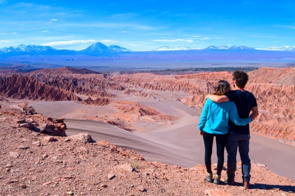 Couple looking over the Atacama desert on a private tour at Tierra Atacama.